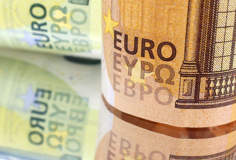 Euro slides to one-month low as Macron calls snap French election